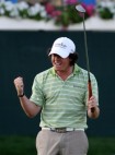 Rory McIlroy of Northern Ireland celebrates after winning the Dubai Desert Classic. The final round of the Dubai Desert Classic played on the Majlis Course on February 1, 2009 in Dubai,United Arab Emirates.  (Photo by Ross Kinnaird/Getty Images)