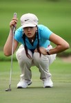 Michelle Wie lines up a putt during the first round of the Sony Open on January 11, 2007 at the Waialae Country Club in Honolulu, Hawaii.  (Photo by Donald Miralle/Getty Images) *** Local Caption *** Michelle Wie