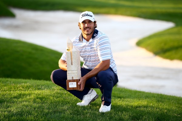KOEPKA WITH THE TURKISH AIRLINES OPEN TROPHY
